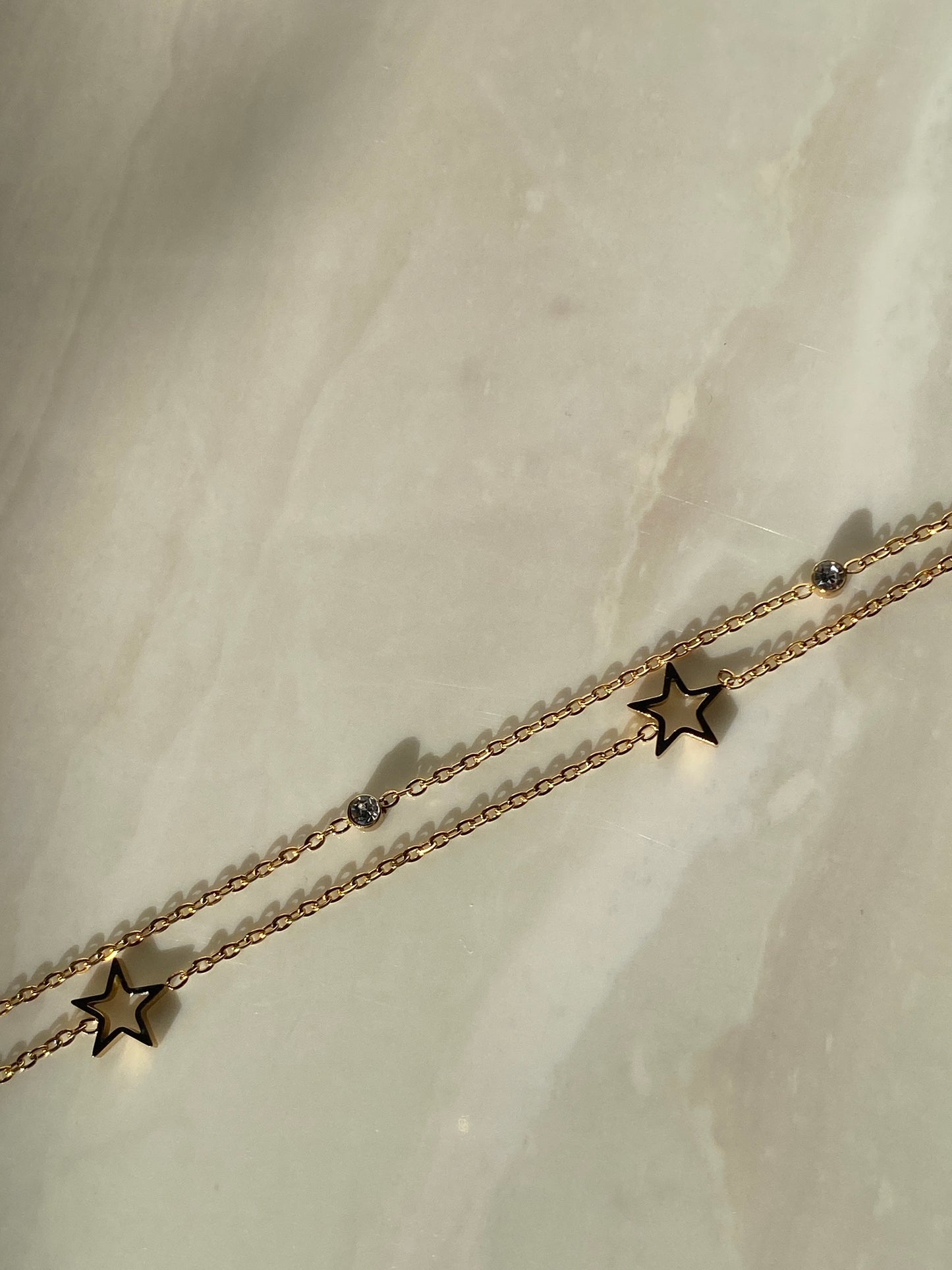 Pulsera de estrellas dorada