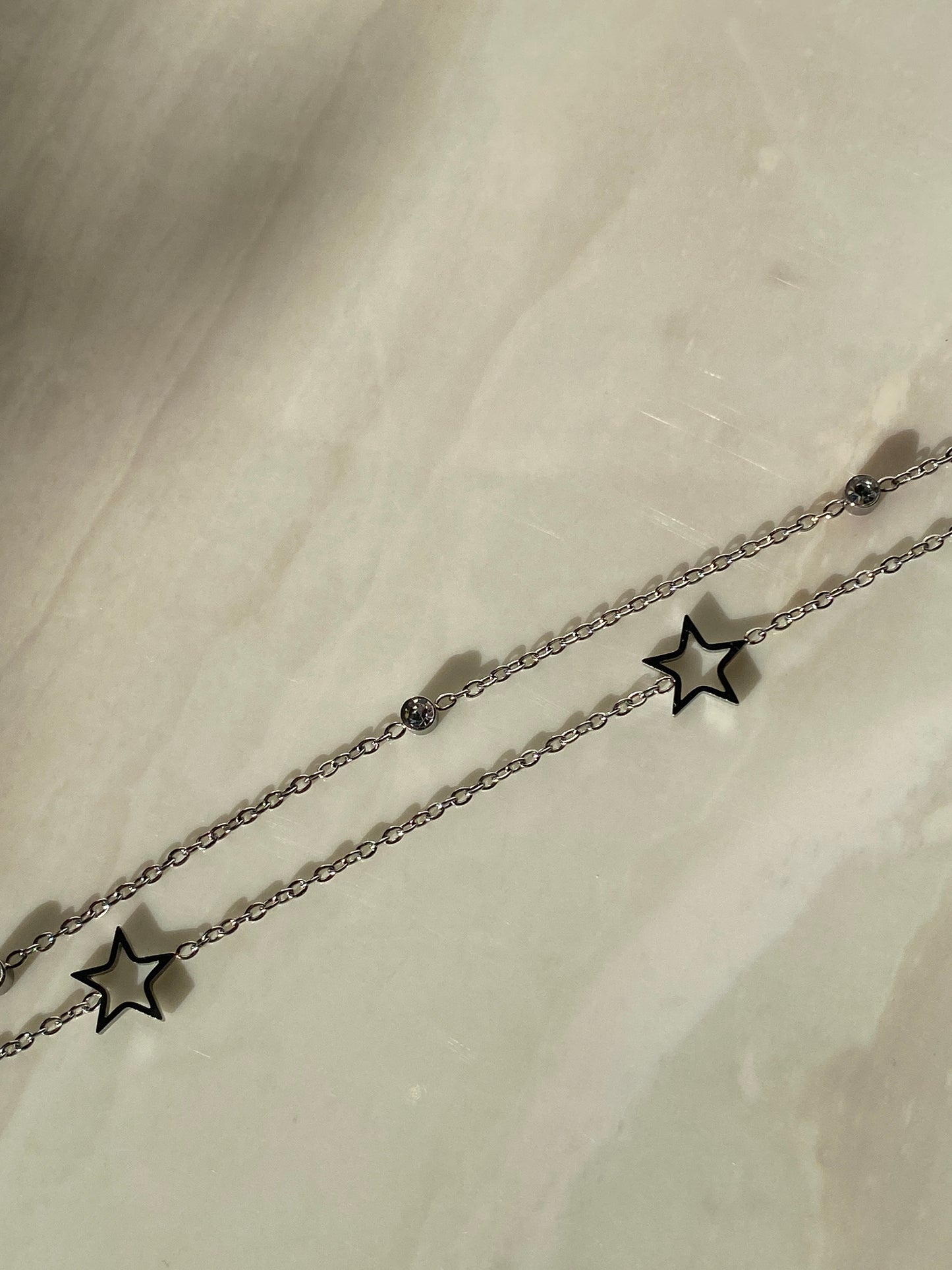 Pulsera estrellas plateada