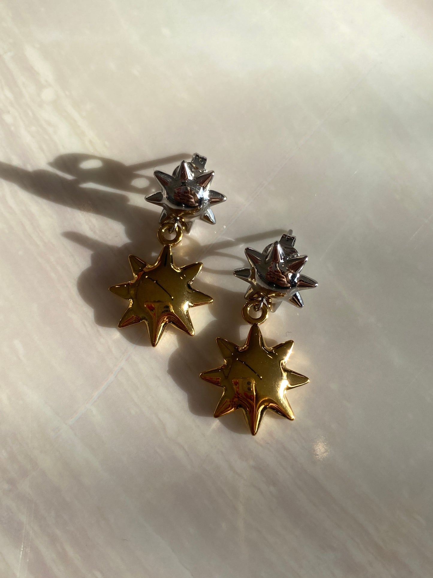 ARETES DORADO CON PLATEADO ACERO INOXIDABLE