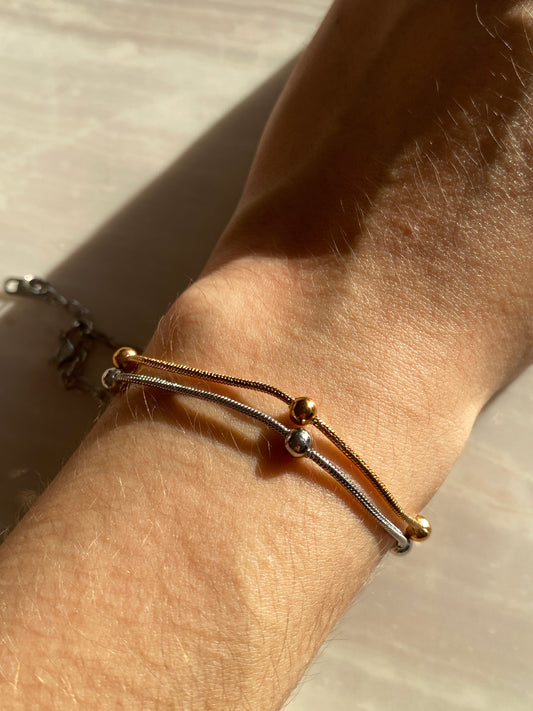 PULSERA PLATEADA Y COBRE ACERO INOXIDABLE