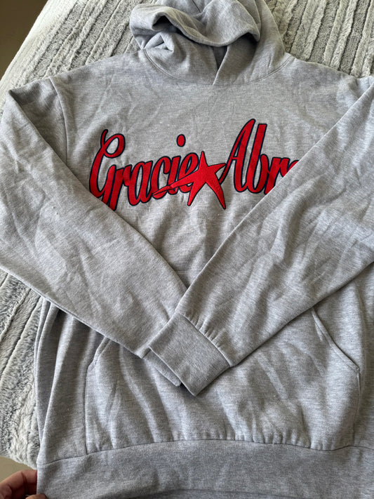 PIEZA DAÑADA -TSOU Deluxe Heather Grey Star Hoodie - LIGERA TEXTURA EN LA ESTRELLA