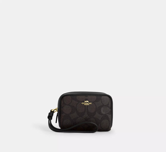 PREORDEN -Pouch Wristlet | COACH - REVISA TIEMPOS DE ENTREGA